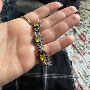 Elegant Silver and Yellow Gemstone Bracelet